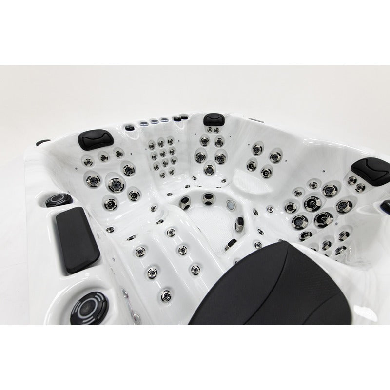 Platinum Spas Palma Hot tub with ergonomic lounger and versatile jet arrangement in the interior
