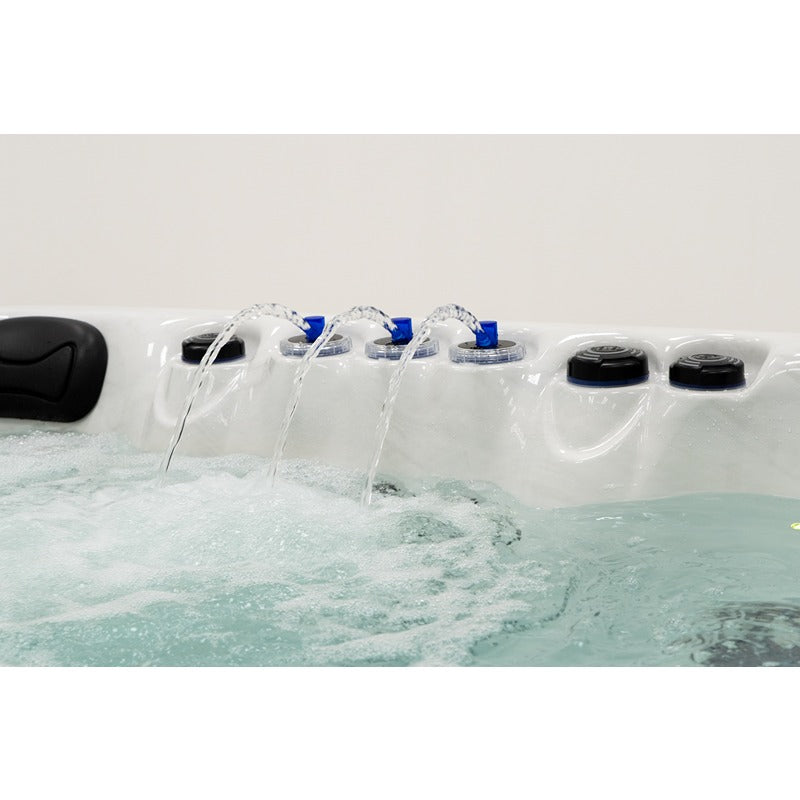 Detailed view of the Platinum Spas Palma whirlpool with integrated water features and adjustable jets